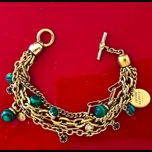 Henri Bendel gold, emerald stone multi link brac